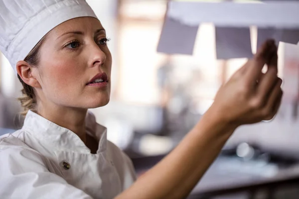 Female Chef Looking Order List Kitchen Hotel — Stock Photo, Image