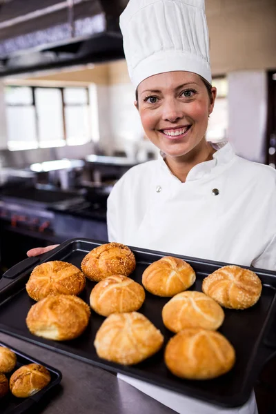 Female Chefs Holding Baking Tray Kaiser Rolls Kitchen Hotel — Stock Photo, Image