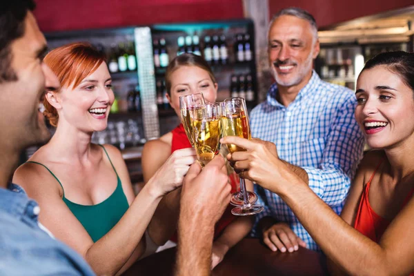 Happy Friends Toasting Champagne Glass Nightclub — Stock Photo, Image