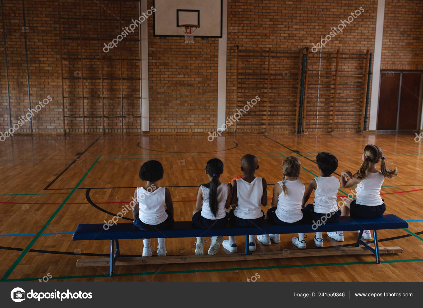Rear View Schoolkids Sitting Bench Basketball Court School Stock Photo