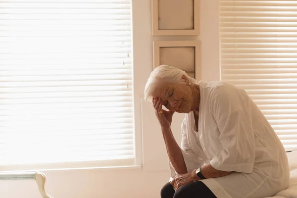 Side View Depressed Senior Woman Holding Her Head While Sitting — Stock Photo, Image