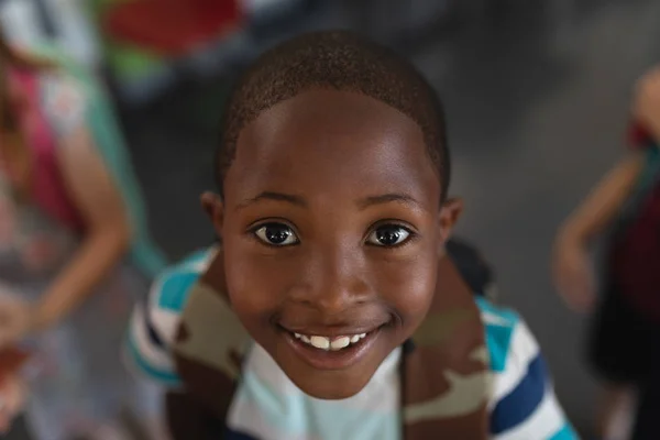 Close Happy Black Schoolboy Schoolbag Looking Camera Classroom Elementary School — Stock Photo, Image