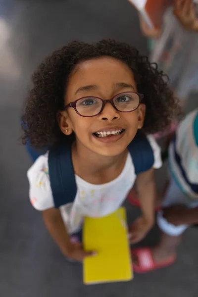 Vista Ángulo Alto Colegiala Feliz Metis Con Bolsa Escuela Cuaderno —  Fotos de Stock