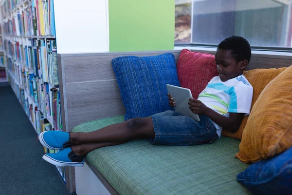 Side View Schoolboy Playing Digital Tablet While Sitting Couch School — Stock Photo, Image