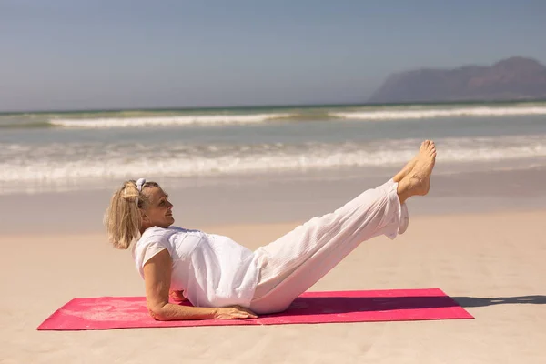 Side View Active Senior Woman Exercising Beach Sunny Day Mountains — Stock Photo, Image