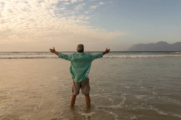 Rear View Senior Man Standing Arms Outstretched Beach — Stock Photo, Image