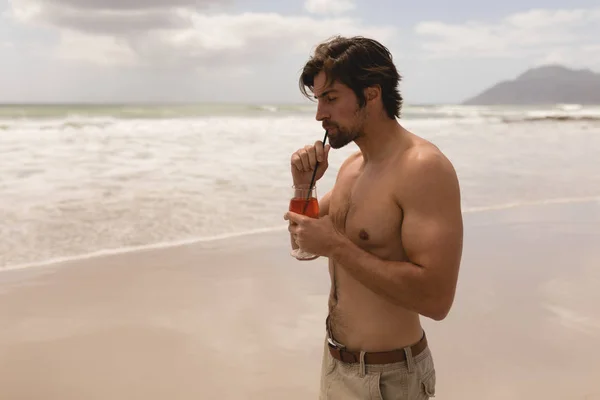 Rear View Shirtless Young Man Drinking Cocktail Beach Sunshine — Stock Photo, Image