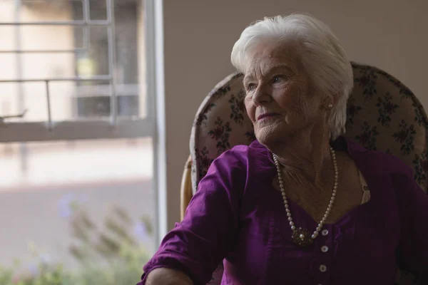 Front View Thoughtful Senior Woman Sitting Looking Away Nursing Home — Stock Photo, Image