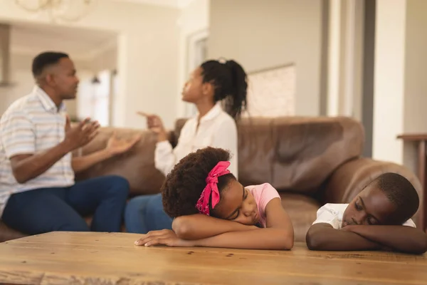 Front View African American Children Leaning Table While Parents Arguing — Stock Photo, Image