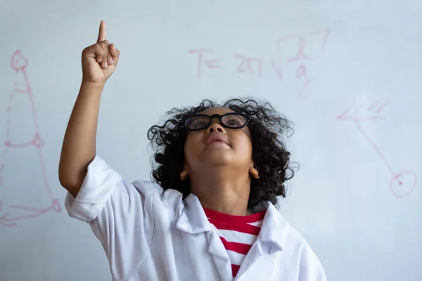 Front View Mixed Race Schoolboy Pointing Finger While Standing Front — Stock Photo, Image