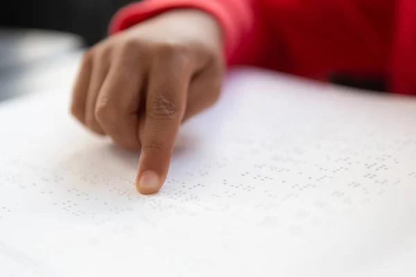 Close Blind Mixed Race Schoolboy Hand Reading Braille Book Classroom — Stock Photo, Image