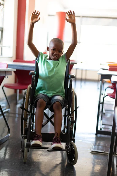 Front View African American Disabled Schoolboy Arms Sitting Wheelchair Classroom — Stock Photo, Image