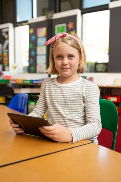 Portrait Caucasian Schoolgirl Using Digital Tablet While Looking Camera Classroom — Stock Photo, Image