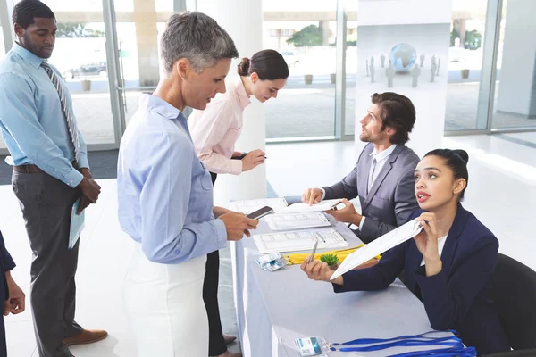 Side View Diverse Business People Checking Conference Registration Table Office — Stock Photo, Image