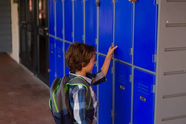 Side View Cute Caucasian Schoolboy Opening Locker Locker Room School — Stock Photo, Image