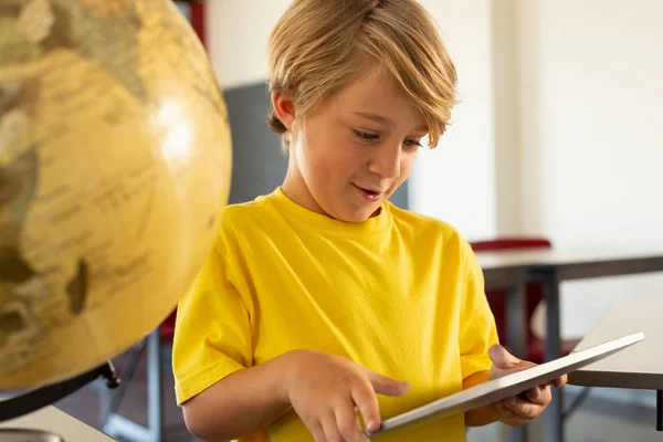 Front View Caucasian Boy Using Digital Tablet Classroom Elementary School — Stock Photo, Image