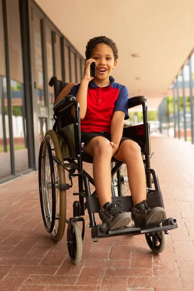 Front View Happy Smiling Mixed Race Disabled Schoolboy Talking Mobile — Stock Photo, Image