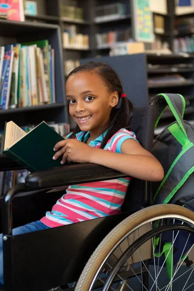 Front View Cute Disabled Mixed Race Schoolgirl Reading Book Classroom — Stock Photo, Image