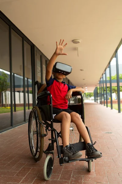 Front View Mixed Race Disabled Schoolboy Using Virtual Reality Headset — Stock Photo, Image