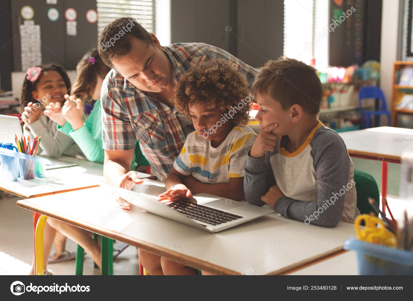 Surface Level View Teacher Teaching How Use Laptop His Pupils Stock