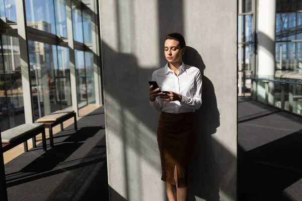 Front View Pretty Young Businesswoman Leaning Wall Using Mobile Phone — Stock Photo, Image