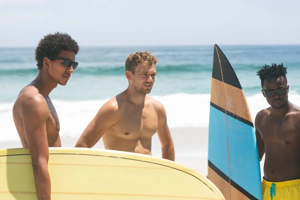 Front View Multi Ethnic Male Friends Standing Holding Surfboard Beach — Stock Photo, Image