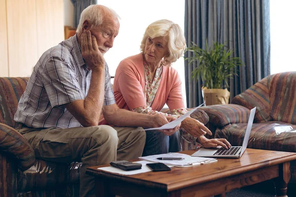 Front View Sad Caucasian Senior Couple Discussing Bill While Sitting — Stock Photo, Image