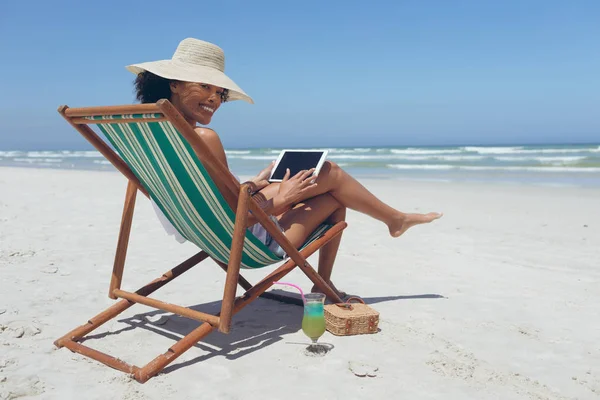 Portrait Happy Mixed Race Woman Using Digital Tablet While Sitting — Stock Photo, Image