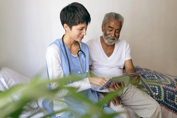 Front View Asian Female Doctor Senior African American Male Patient — Stock Photo, Image