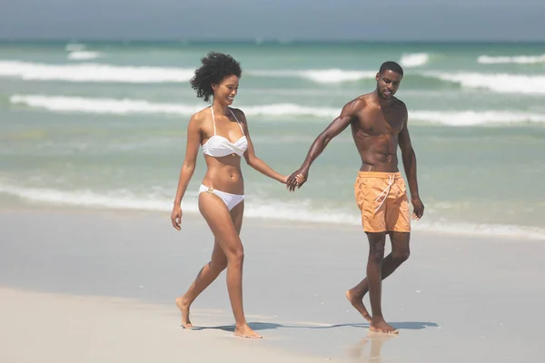 Front View Multi Ethnic Couple Walking Hand Hand Beach Sunny — Stock Photo, Image