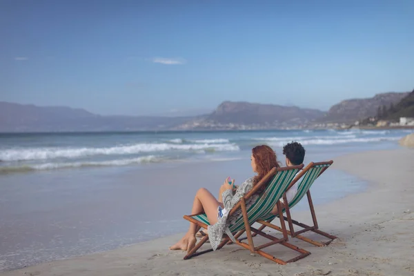 Rear View Caucasian Couple Relaxing Sun Lounger Front Ocean Beach — Stock Photo, Image