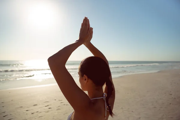 Vista Trasera Mujer Realizando Yoga Playa —  Fotos de Stock