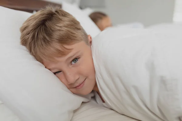 Side View Cute Caucasian Boy Looking Camera While Lying Bed — Stock Photo, Image