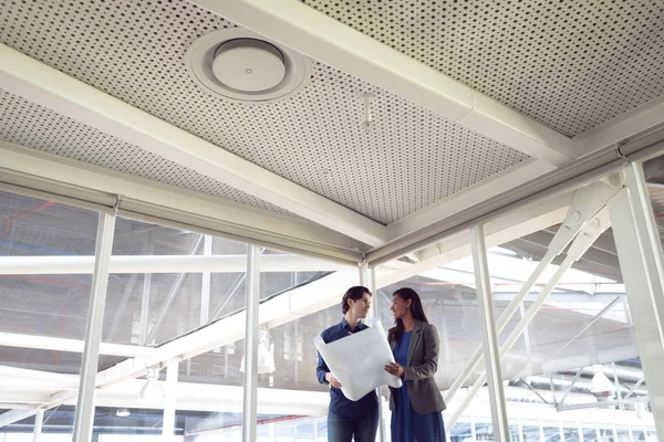 Low View Diverse Male Female Architects Discussing Blueprint Office — Stock Photo, Image