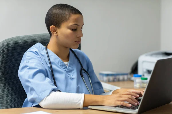 Front View Mixed Race Female Doctor Working Laptop Desk Examination — ストック写真