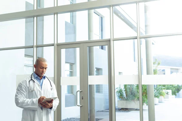 Front View Mixed Race Male Doctor Using Digital Tablet Lobby — Stock Photo, Image