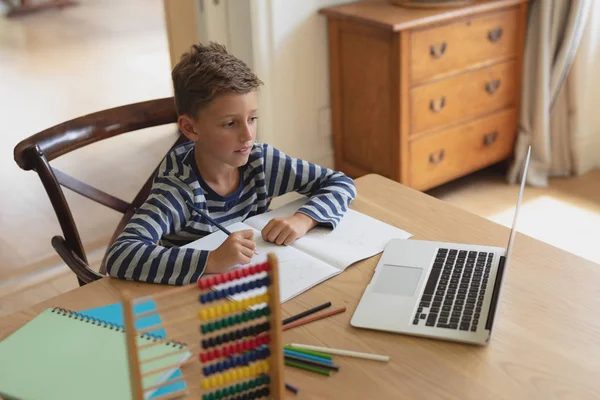 High Angle View Caucasian Boy Doing Homework Table Comfortable Home — Stock Photo, Image