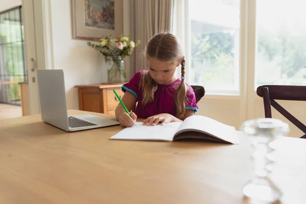 Front View Cute Caucasian Girl Doing Homework Dining Table Comfortable — Stock Photo, Image