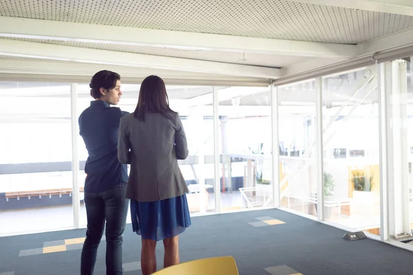 Rear View Male Female Architects Interacting Each Other Office — Stock Photo, Image