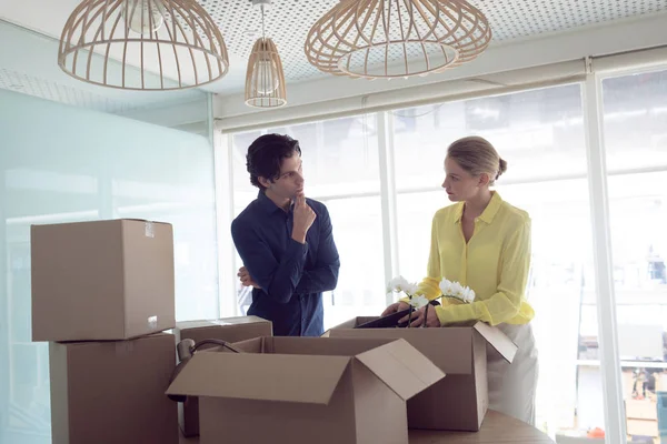 Front View Caucasian Male Female Office Executives Opening Boxes While — Stock Photo, Image