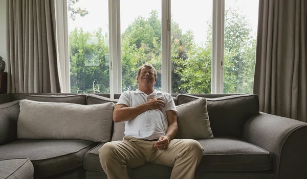 Front View Active Senior Caucasian Man Suffering Chest Pain Sofa — Stock Photo, Image