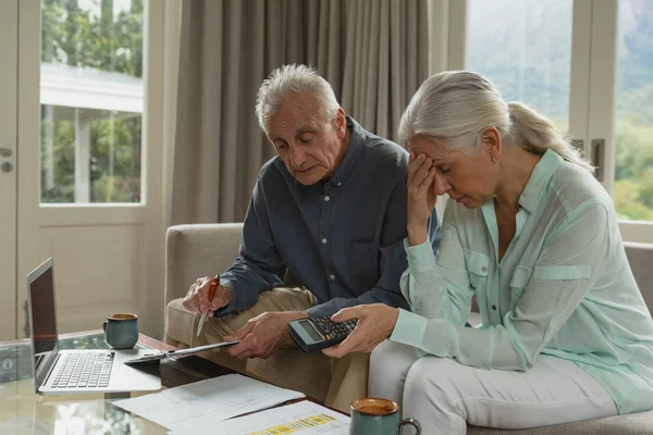 Side View Active Senior Caucasian Couple Calculating Bills Living Room — Stock Photo, Image