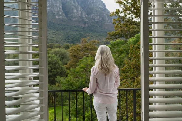 Rear View Active Senior Caucasian Woman Standing Balcony Home — Stock Photo, Image