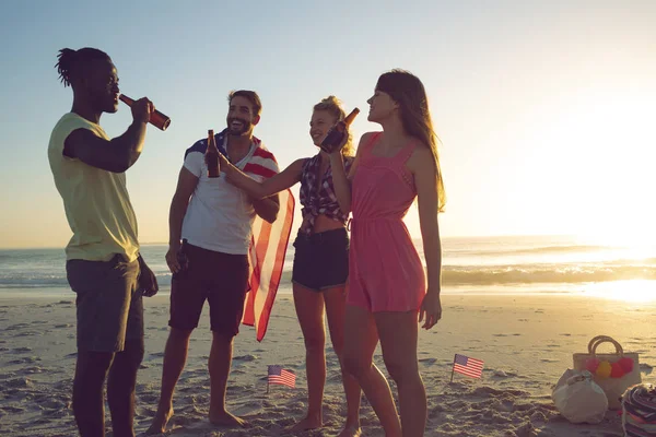 Side View Happy Group Diverse Friends Drinking Beer Beach Sunset — Stock Photo, Image