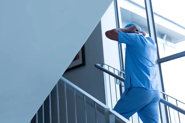 Rear View Caucasian Male Surgeon Putting Surgical Mask While Walking — Stock Photo, Image