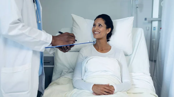 Side View African American Male Doctor Interacting Mixed Race Female — Stock Photo, Image