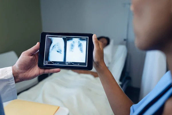 Mid Section Diverse Male Female Doctors Looking Ray Report Digital — Stock Photo, Image