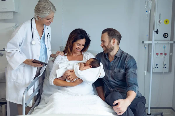 Front View Caucasian Couple Doctor Holding Newborn Baby Ward — Stock Photo, Image