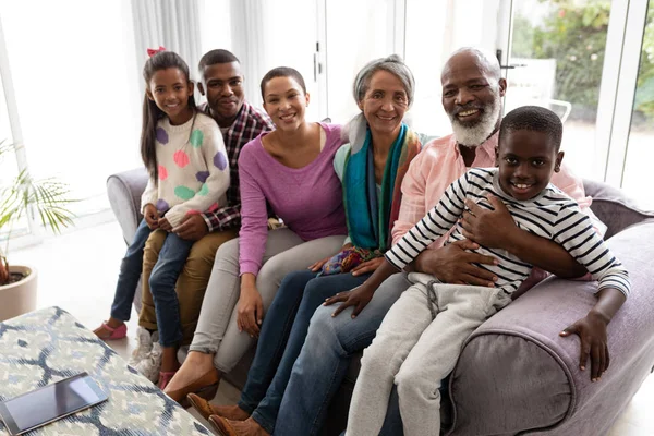 Portrait of African american Multi-generation family relaxing together on a sofa in living room at home