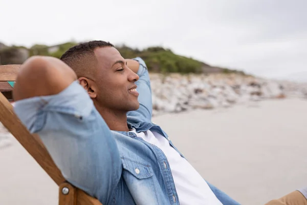 Side View African American Man Relaxing Hands Head Beach Chair — Stock Photo, Image